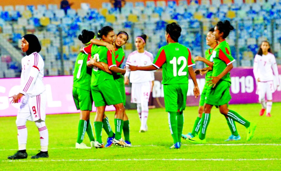Players of Bangladesh Under-19 National Women's Football team celebrating after scoring a goal against United Arab Emirates Under-19 National Women's Football team in the opening match of the Bangamata Under-19 Women's International Gold Cup Football a