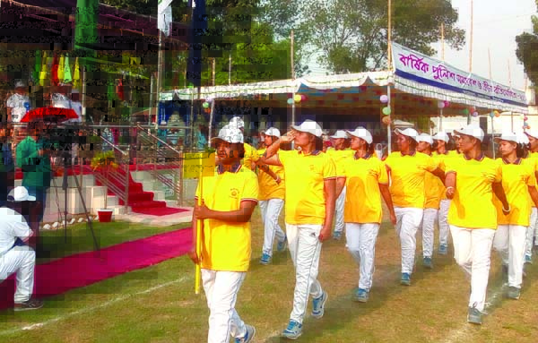 Additional Inspector General (Administration) of Bangladesh Police Md Mokhlesur Rahman taking salute from the participants of the Annual Sports Competition of Thakurgaon District Police at Thakurgaon District Police Lines Ground on Wednesday. Additio