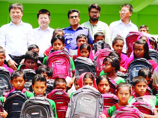 TALTOLI (Barguna): Power China Resources Ltd, a subsidiary organisation of Isotech Group distributed school bags and sports equipment among 108 underprivileged children of primary schools at Taltoli Upazila in Barguna district on Thursday. Barishal Po