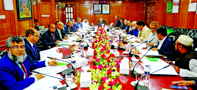 Professor Md. Nazmul Hassan, Chairman of Islami Bank Bangladesh Limited, presiding over its Board of Directors meeting at the Bank's head office in the city on Wednesday. Yousif Abdullah Al-Rajhi, Md. Shahabuddin, Vice-Chairmen, Md. Mahbub ul Alam, Mana