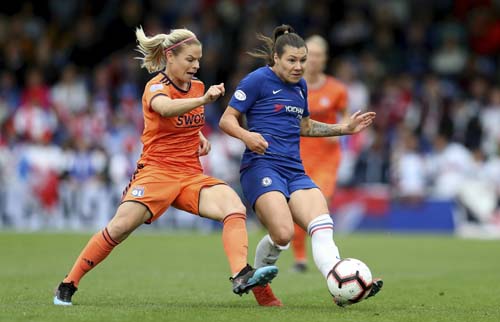 Chelsea's Ramona Bachmann (right) in action during their UEFA Women's Champions League semi final second leg soccer match against Lyon at the Cherry Red Records Stadium, London on Sunday.