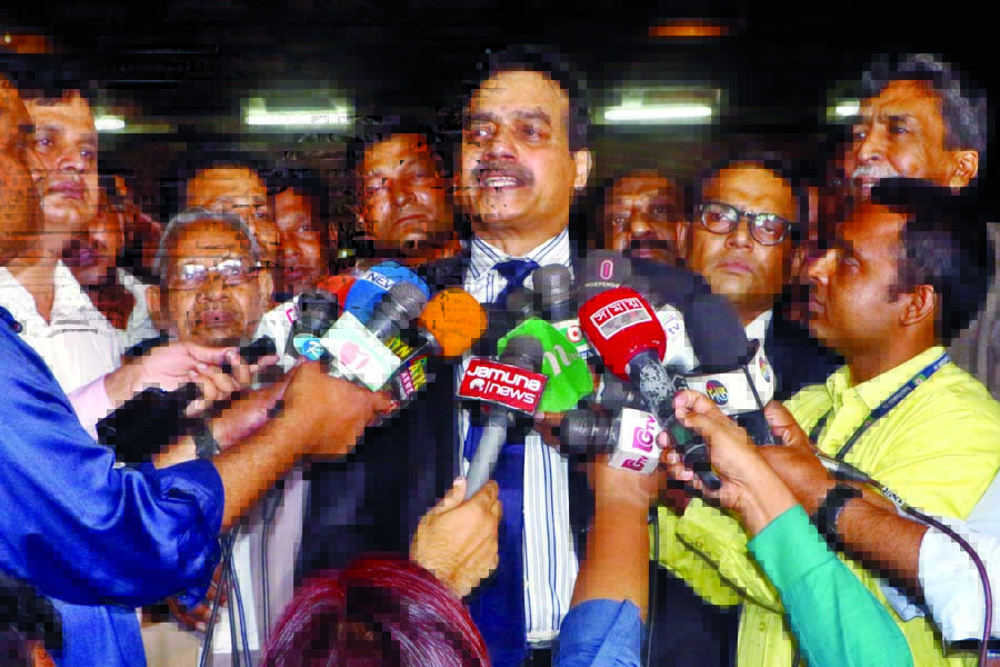 MP Harun-or-Rashid elected with BNP ticket from Chapainawabganj-3 Seat speaking with the reporters in front of the Jatiya Sangsad Bhaban after taking oath on Monday.