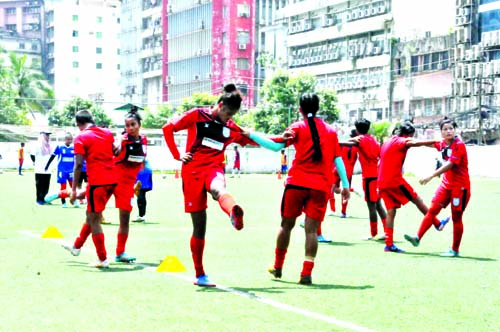 Members of Bangladesh Under-19 National Women's Football team taking part at the practice session at the BFF Artificial Turf on Thursday.