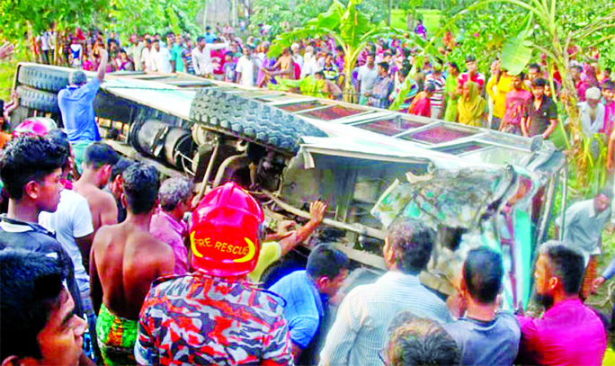 Three people were killed and 12 others were injured when a bus overturned at Mirganj Bazar in Bagha upazila on Thursday.