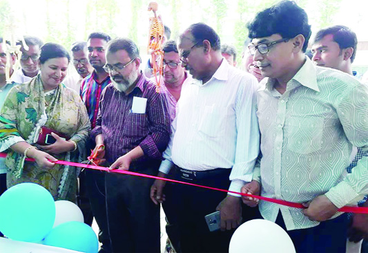 MANIKGANJ: Md Moniruzzaman Khan, Singair Upazila Higher Secondary Education Officer with Md Akram Hossain, Headmaster, Singair Pilot High School inaugurating the Science Fair on the School premises on Sunday. Among others, Md Altaf Hossain, Chairman, M