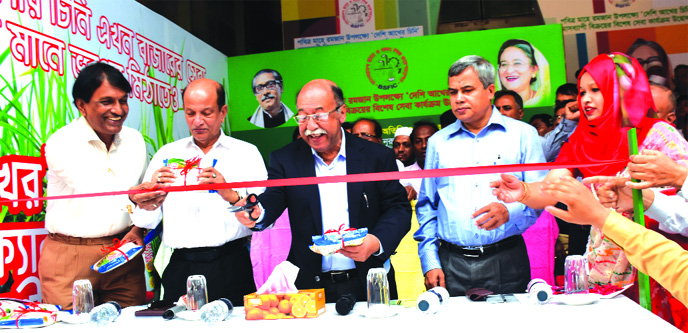 Industries Minister Nurul Majid Mahmud Humayun, inaugurating the month long special service and sales programme of local sugar ahead of Ramzan in the city on Thursday.