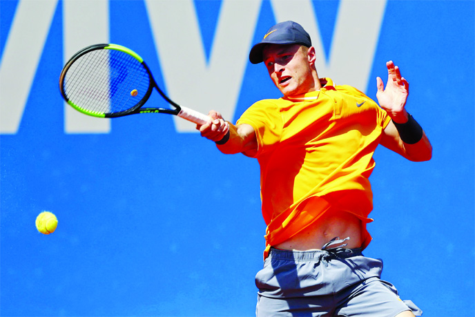Rudolf Molleker of Germany, returns the ball to Roberto Bautista Agut of Spain, during the round of sixteen match at the ATP tennis tournament in Munich, Germany on Thursday.