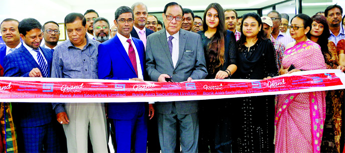 A Rouf Chowdhury, Chairman of Bank Asia Limited and Bank Asia Securities Limited, inaugurating the new head office of the Securities in the city's Dilkusha area on Sunday. Zakia Rouf Chowdhury, Executive Vice-Chairperson of Rangs Group, Amiran Hossain,