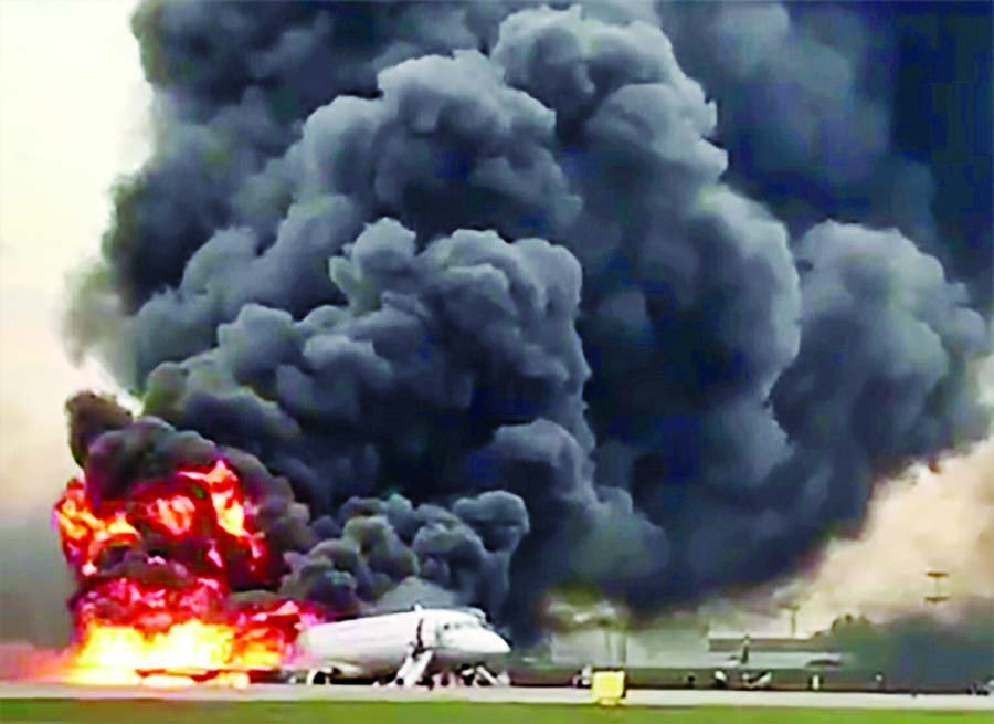 A view shows a damaged Aeroflot Sukhoi Superjet 100 passenger plane after an emergency landing at Moscow's Sheremetyevo airport.