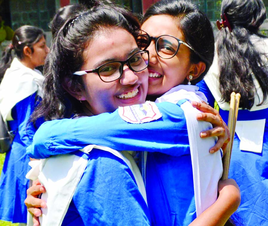 Students of Rajshahi Govt girls High School rejoicing their successes in SSC exams on Monday.