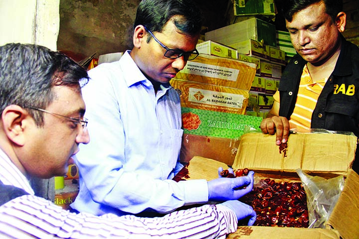 RAB members conducted anti-adulteration raid on different food items including date and other fruits in the city's Badamtali and Babu Bazar areas on Tuesday.