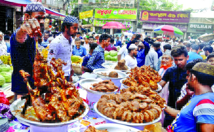 Chawkbazar iftar market gets momentum on the first day of holy Ramzan on Tuesday.