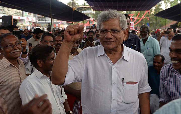 Sitaram Yechury, President of the Communist Party of India (Marxist), gestures amongst supporters at an election campaign rally in Perambra in the south Indian state of Kerala.