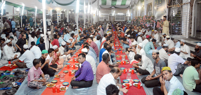 Participants offering Munajat at a Iftar Mahfil arranged by AB M Mohiuddin Chowdhury Foundation on Tuesday.