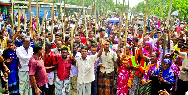 Agitating workers of jute mills brought out a procession in Demra area on Wednesday to realise their nine-point charter of demands.