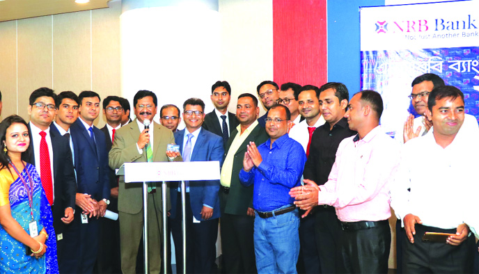 Md Mehmood Husain, Managing Director of NRB Bank Limited, launching Debit Card for Agent Banking Customers at its head office recently. Imran Ahmed FCA, Chief Operating Officer, Milton Roy, Head of Agent banking and Foreign Remittance Department, among ot