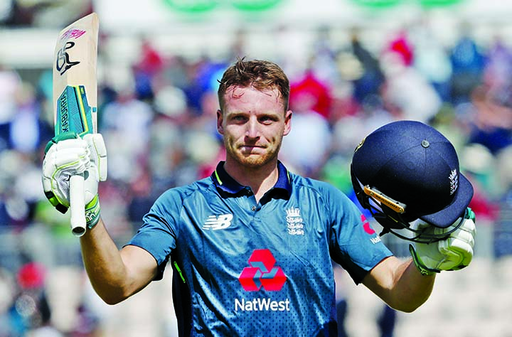 England's Jos Buttler celebrates scoring a century during the second One Day International cricket match between England and Pakistan at The Ageas Bowl in Southampton, England on Saturday.
