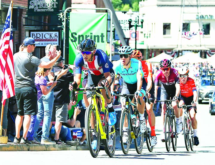 The leaders of the second stage of the Amgen Tour of California cycling race sprint down historic Main Street in Placerville, Calif on Monday.