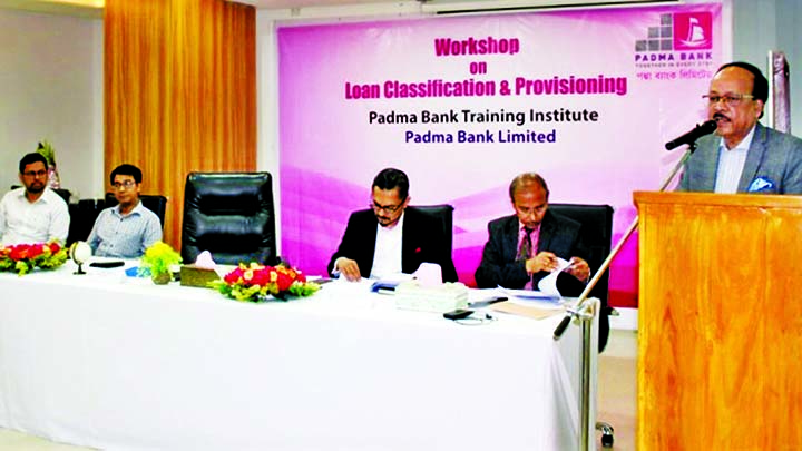 Md. Ehsan Khasru, Managing Director of Padma Bank Limited, addressing a daylong workshop on "Loan Classification & Provisioning" for branch managers and credit in-charges at its Training Institute in the city on Saturday. DMD Muhammad Ali Zaryab and SME