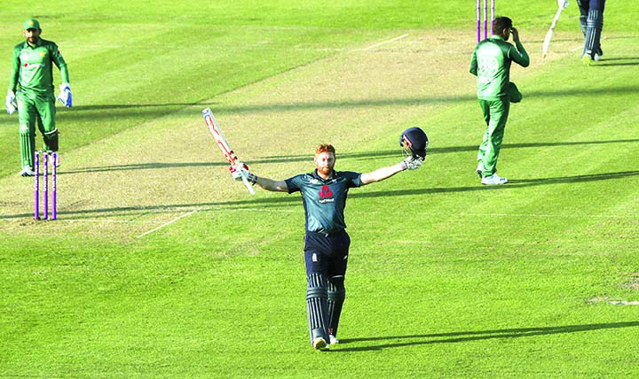 England's Jonny Bairstow celebrates reaching his century during the One Day International cricket match against Pakistan at the Bristol County Ground, Bristol, England on Tuesday.