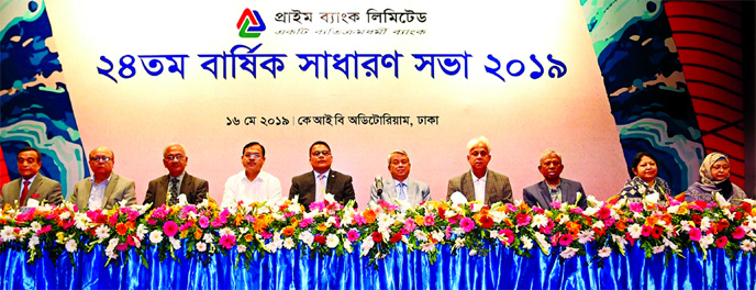 Azam J Chowdhury, Chairman, Board of Directors of Prime Bank Limited, presiding over its 24th Annual General Meeting (AGM) at an auditorium in the city on Thursday. EC Chairman Md. Shirajul Islam Mollah, Chairman of Risk Management Committee Dr. G.M. Khu