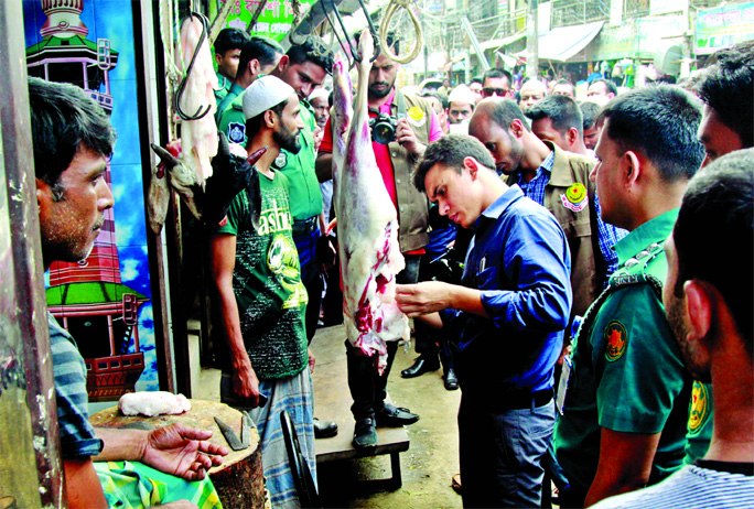 DMP mobile team led by a magistrate raided a market in city's Wari area and realised Taka one lakh 30 thousand as fine for selling rotten beef. This photo was taken on Thursday.