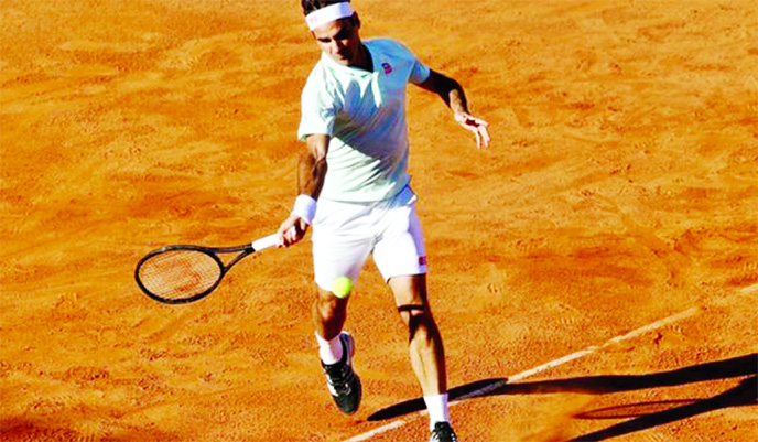 World number three Roger Federer saved two match points in defeating 13th seed Borna Coric 2-6 6-4 7-6 (9-7) to reach the quarter-finals of the Italian Open in Rome on Thursday.