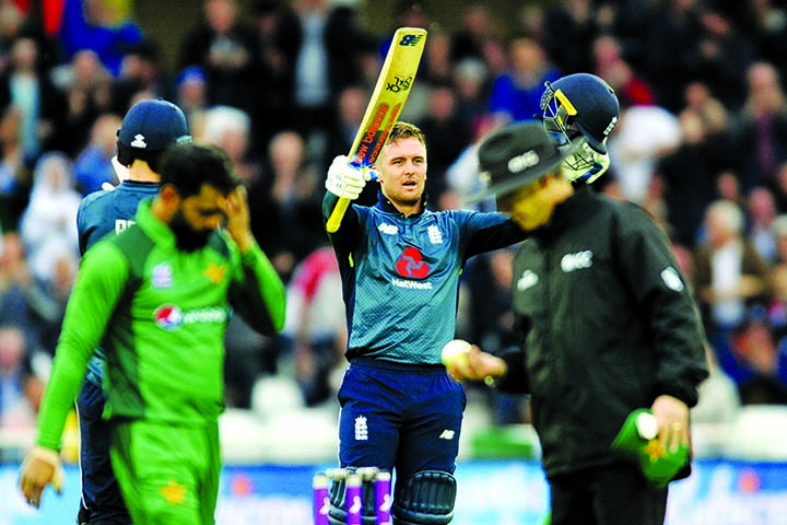 England's Jason Roy (center) celebrates scoring a century during the fourth One Day International cricket match between England and Pakistan at Trent Bridge in Nottingham, England on Friday.