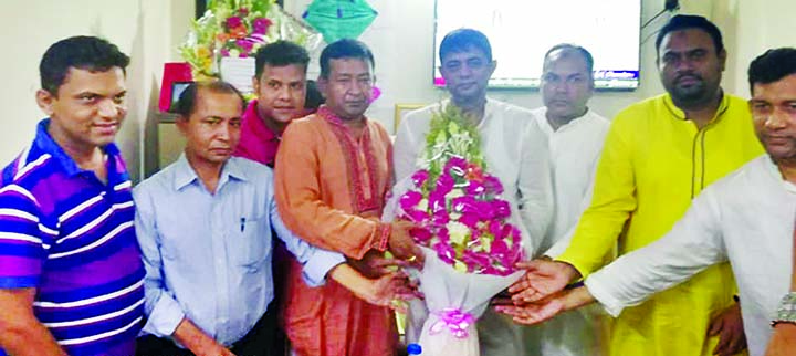 Bangladesh Awami Swechchhasebok League Acting General Secretary Gazi Mesbaul Hossain Shachchu being greeted by leaders and activists at his Kafrul office as he has taken charge of Acting General Secretary of the organization recently .