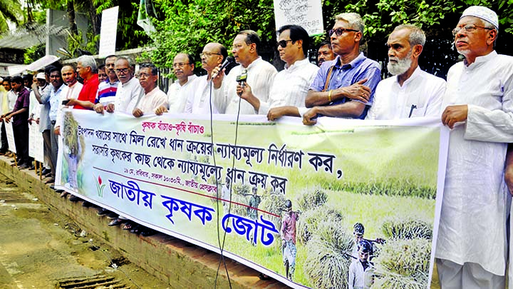 Former Information Minister Hasnul Haq Inu MP speaking at a human chain demanding fair price of paddy organized by Jatiya Krishok Jote in front of the Jatiya Press Club yesterday.