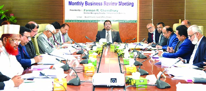 Farman R Chowdhury, Managing Director of Al-Arafah Islami Bank Ltd, presiding over the Bank's monthly business review meeting at its head office in the city. DMDs Fazlul Karim, S M Jaffar, Mohammed Zubair Wafa, Shabbir Ahmed and Md. Shafiqur Rahman, amo