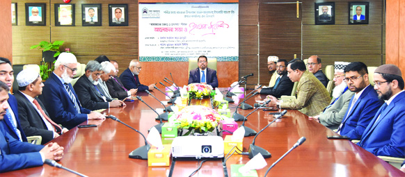 Farman R Chowdhury, Managing Director of Al-Arafah Islami Bank Ltd, presiding a discussion on "Values and Significances of Ramzan" at the Bank's head office on Wednesday. DMDs Md. Fazlul Karim, S M Jaffar and Mohammed Zubair Wafa, among others, were pr
