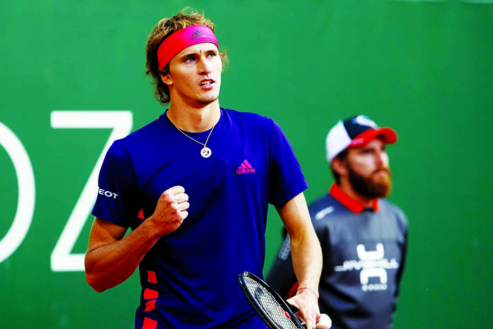 Alexander Zverev of Germany, celebrates defeating Ernests Gulbis of Latvia, during their second round match at the ATP 250 Geneva Open tournament in Geneva, Switzerland on Tuesday.