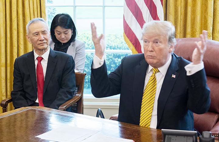 US President Donald Trump speaks during a trade meeting with China's Vice Premier Liu He in the Oval Office at the White House in Washington.