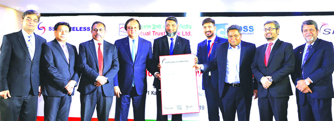 Anis A. Khan, Managing Director & CEO of Mutual Trust Bank Limited is holding Payment Card Industry Data Security Standard certificate at a ceremony held at MTB Tower. Other high officials from both MTB and SSL Wireless are also seen, among others.