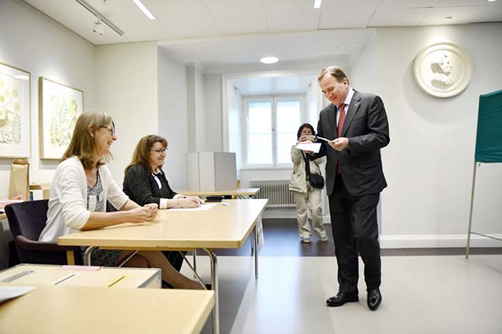 Swedish Prime Minister Stefan Lofven prepares to cast his vote at a polling station during the European Parliament elections in Stockholm, Sweden on Sunday.