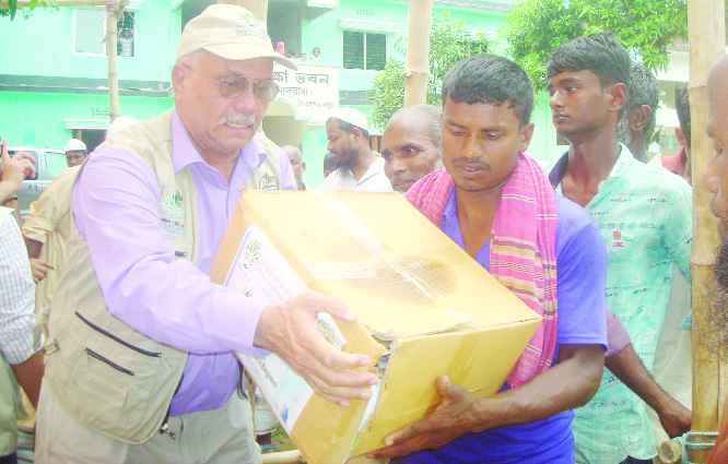 TARAGANJ (Rangpur): Officials of International Organization for Relief, Welfare and Development (IORWD) distributing Iftar items among Underprivileged people at Taraganj Upazila in Rangpur yesterday.