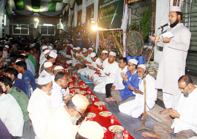 Participants offering Munajat at an Iftar Mahfil organised by Mohiuddin Foundation on Saturday.