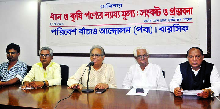 Chairman of Save the Environment Movement Abu Naser Khan speaking at a seminar on 'Fair Price of Paddy and other Agricultural Products: Crisis and Proposals' organised by the movement at the Jatiya Press Club on Monday.
