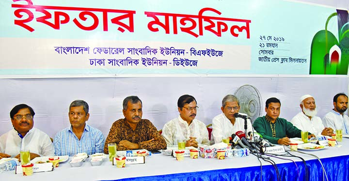 BNP Secretary General Mirza Fakhrul Islam Alamgir, among others, at an Iftar Mahfil organised by a faction of BFUJ and DUJ at the Jatiya Press Club on Monday.