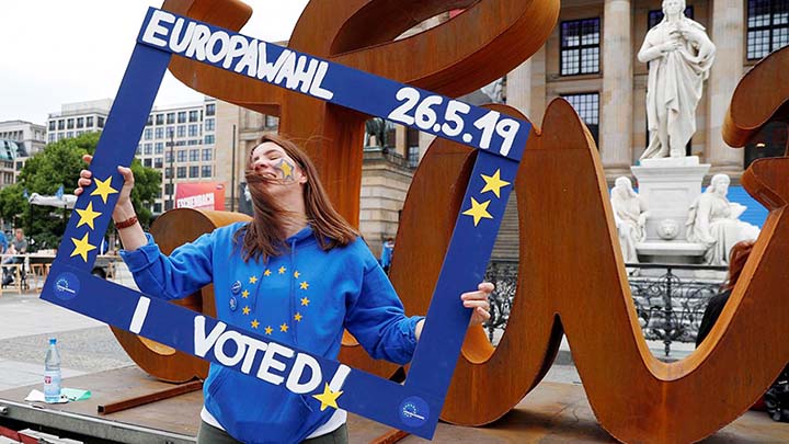 Woman attends an event by pro-European "Pulse of Europe" movement, during the European Parliament elections at Gendarmenmarkt square in Berlin, Germany.