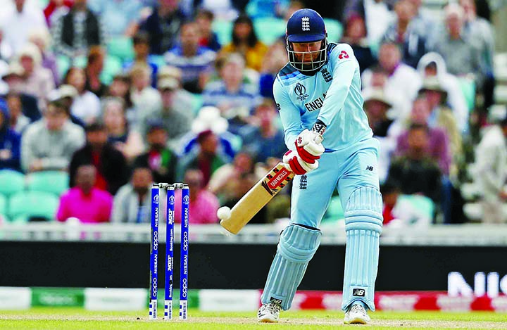 England's Jonny Bairstow returns the ball during the Cricket World Cup warm up match between England and Afghanistan at the Oval in London on Monday.