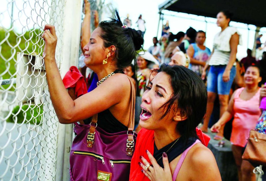 Relatives of inmates in front of a prison complex in the Brazilian state of Amazonas, one of four jails in the state where 55 inmates died in fighting on Sunday and Monday.