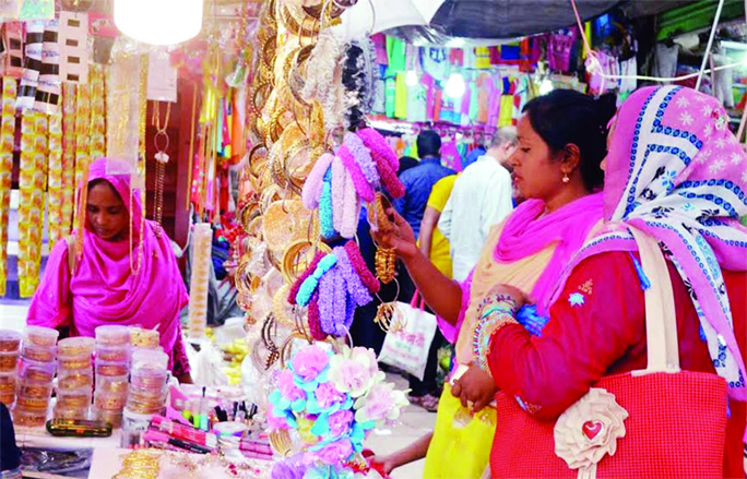 RAJSHAHI: Shopping malls at Rajshahi became more crowded ahead of Eid. This snap was taken on Tuesday.