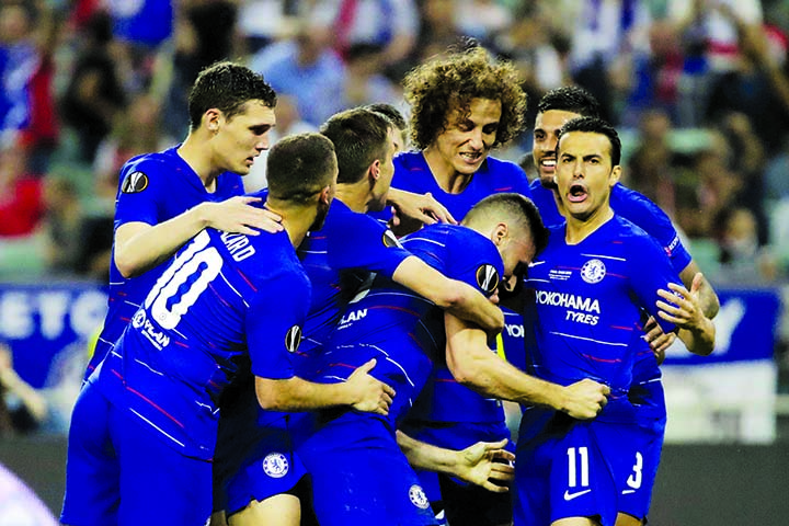 Chelsea's Olivier Giroud (center) celebrates with his teammates scoring his side's opening goal during the Europa League Final soccer match between Arsenal and Chelsea at the Olympic stadium in Baku, Azerbaijan on Wednesday.