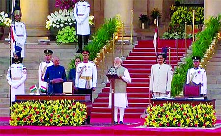 India's President Ram Nath Kovind administers oath of India's Prime Minister Narendra Modi during a swearing-in ceremony at the presidential palace in New Delhi, India May 30, 2019. Ruters photo