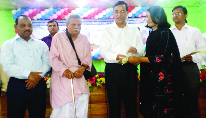 NETRAKONA: Sazzadul Hasan, Secretary of Prime Minister Office distributing stipend among the meritorious students as Chief Guest at Public Hall organised by Netrakona Foundation on Wednesday.