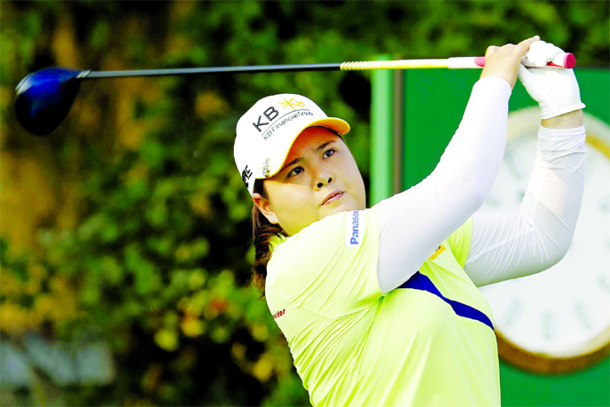 Inbee Park of South Korea, watches her shot of the first tee-off during the first round of the U.S. Women's Open golf tournament in Charleston on Thursday .