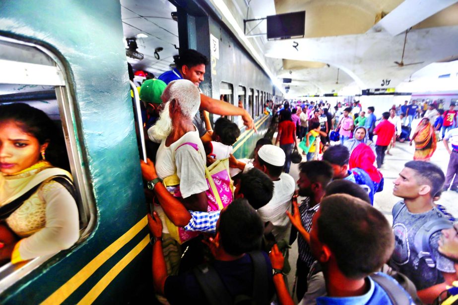 Madrush of holidaymakers started leaving the capital for homes to celebrate Eid with their near and dear ones as four days ahead of the festival but their sufferings mount following disruption in the schedules of a number of trains. This photo was taken f