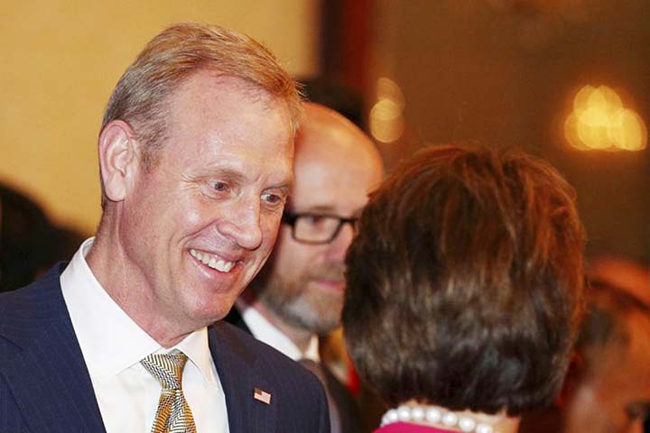 Acting U.S. Secretary of Defense Patrick Shanahan, left, arrives for the opening dinner of the 18th International Institute for Strategic Studies (IISS) Shangri-la Dialogue, an annual defense and security forum in Asia, in Singapore on Friday.